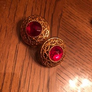 Gold earrings w/ red center stone